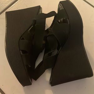 Donald Pliner black leather sandals.